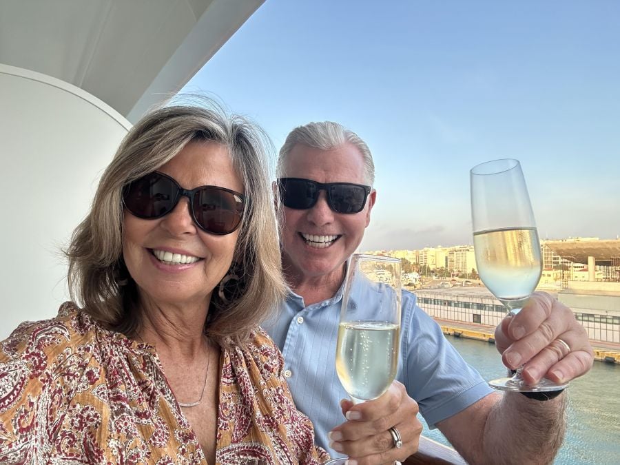 </who>Kerry and Steve MacNaull on their stateroom balcony sailing away from Athens.